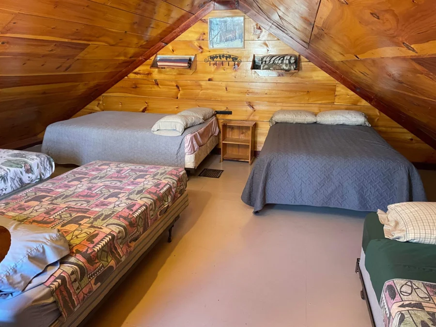 Fox Cabin hunting rental bedroom Pine Cone Acres Rustic Cabin Rental Solon Maine